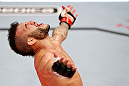 JARAGUA DO SUL, BRAZIL - MAY 18:   John Lineker reacts after knocking out Azamat Gashimov in their flyweight bout during the UFC on FX event on May 18, 2013 at Arena Jaragua in Jaragua do Sul, Santa Catarina, Brazil.  (Photo by Josh Hedges/Zuffa LLC/Zuffa LLC via Getty Images)