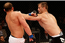 JARAGUA DO SUL, BRAZIL - MAY 18: (R-L) Fabio Maldonado punches Roger Hollett in their light heavyweight bout during the UFC on FX event on May 18, 2013 at Arena Jaragua in Jaragua do Sul, Santa Catarina, Brazil. (Photo by Josh Hedges/Zuffa LLC/Zuffa LLC via Getty Images)