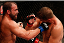 JARAGUA DO SUL, BRAZIL - MAY 18: (L-R) Roger Hollett punches Fabio Maldonado in their light heavyweight bout during the UFC on FX event on May 18, 2013 at Arena Jaragua in Jaragua do Sul, Santa Catarina, Brazil. (Photo by Josh Hedges/Zuffa LLC/Zuffa LLC via Getty Images)