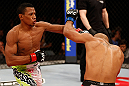 JARAGUA DO SUL, BRAZIL - MAY 18: (L-R) Yuri Alcantara punches Iliarde Santos in their bantamweight bout during the UFC on FX event on May 18, 2013 at Arena Jaragua in Jaragua do Sul, Santa Catarina, Brazil. (Photo by Josh Hedges/Zuffa LLC/Zuffa LLC via Getty Images)