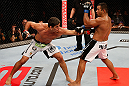 JARAGUA DO SUL, BRAZIL - MAY 18: (L-R) Paulo Thiago punches Michel Prazeres in their welterweight bout during the UFC on FX event on May 18, 2013 at Arena Jaragua in Jaragua do Sul, Santa Catarina, Brazil. (Photo by Josh Hedges/Zuffa LLC/Zuffa LLC via Getty Images)