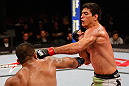 JARAGUA DO SUL, BRAZIL - MAY 18: (R-L) Paulo Thiago punches Michel Prazeres in their welterweight bout during the UFC on FX event on May 18, 2013 at Arena Jaragua in Jaragua do Sul, Santa Catarina, Brazil. (Photo by Josh Hedges/Zuffa LLC/Zuffa LLC via Getty Images)