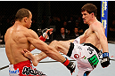 JARAGUA DO SUL, BRAZIL - MAY 18: (R-L) John Cholish kicks Gleison Tibau in their lightweight bout during the UFC on FX event on May 18, 2013 at Arena Jaragua in Jaragua do Sul, Santa Catarina, Brazil. (Photo by Josh Hedges/Zuffa LLC/Zuffa LLC via Getty Images)