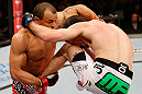 JARAGUA DO SUL, BRAZIL - MAY 18: (L-R) Gleison Tibau punches John Cholish in their lightweight bout during the UFC on FX event on May 18, 2013 at Arena Jaragua in Jaragua do Sul, Santa Catarina, Brazil. (Photo by Josh Hedges/Zuffa LLC/Zuffa LLC via Getty Images)