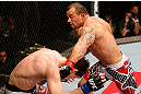 JARAGUA DO SUL, BRAZIL - MAY 18: (R-L) Gleison Tibau punches John Cholish in their lightweight bout during the UFC on FX event on May 18, 2013 at Arena Jaragua in Jaragua do Sul, Santa Catarina, Brazil. (Photo by Josh Hedges/Zuffa LLC/Zuffa LLC via Getty Images)