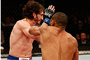 JARAGUA DO SUL, BRAZIL - MAY 18:   (R-L) Francisco Trinaldo punches Mike Rio in their lightweight bout during the UFC on FX event on May 18, 2013 at Arena Jaragua in Jaragua do Sul, Santa Catarina, Brazil.  (Photo by Josh Hedges/Zuffa LLC/Zuffa LLC via Getty Images)