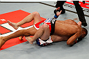 JARAGUA DO SUL, BRAZIL - MAY 18:   (R-L) Francisco Trinaldo secures an arm triangle choke against Mike Rio in their lightweight bout during the UFC on FX event on May 18, 2013 at Arena Jaragua in Jaragua do Sul, Santa Catarina, Brazil.  (Photo by Josh Hedges/Zuffa LLC/Zuffa LLC via Getty Images)