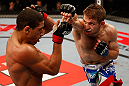 JARAGUA DO SUL, BRAZIL - MAY 18: (R-L) Nik Lentz punches Hacran Dias in their featherweight bout during the UFC on FX event on May 18, 2013 at Arena Jaragua in Jaragua do Sul, Santa Catarina, Brazil. (Photo by Josh Hedges/Zuffa LLC/Zuffa LLC via Getty Images)