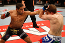 JARAGUA DO SUL, BRAZIL - MAY 18: (L-R) Hacran Dias punches Nik Lentz in their featherweight bout during the UFC on FX event on May 18, 2013 at Arena Jaragua in Jaragua do Sul, Santa Catarina, Brazil. (Photo by Josh Hedges/Zuffa LLC/Zuffa LLC via Getty Images)