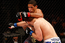 JARAGUA DO SUL, BRAZIL - MAY 18: (R-L) Nik Lentz and Hacran Dias trade punches in their featherweight bout during the UFC on FX event on May 18, 2013 at Arena Jaragua in Jaragua do Sul, Santa Catarina, Brazil. (Photo by Josh Hedges/Zuffa LLC/Zuffa LLC via Getty Images)
