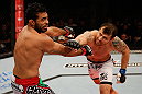 JARAGUA DO SUL, BRAZIL - MAY 18: (R-L) Joao Zeferino punches Rafael Natal in their middleweight bout during the UFC on FX event on May 18, 2013 at Arena Jaragua in Jaragua do Sul, Santa Catarina, Brazil. (Photo by Josh Hedges/Zuffa LLC/Zuffa LLC via Getty Images)