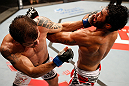 JARAGUA DO SUL, BRAZIL - MAY 18: (L-R) Joao Zeferino punches Rafael Natal in their middleweight bout during the UFC on FX event on May 18, 2013 at Arena Jaragua in Jaragua do Sul, Santa Catarina, Brazil. (Photo by Josh Hedges/Zuffa LLC/Zuffa LLC via Getty Images)