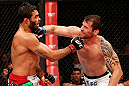 JARAGUA DO SUL, BRAZIL - MAY 18: (R-L) Joao Zeferino punches Rafael Natal in their middleweight bout during the UFC on FX event on May 18, 2013 at Arena Jaragua in Jaragua do Sul, Santa Catarina, Brazil. (Photo by Josh Hedges/Zuffa LLC/Zuffa LLC via Getty Images)