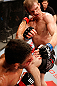 JARAGUA DO SUL, BRAZIL - MAY 18: (L-R) Rafael dos Anjos punches Evan Dunham in their lightweight bout during the UFC on FX event on May 18, 2013 at Arena Jaragua in Jaragua do Sul, Santa Catarina, Brazil. (Photo by Josh Hedges/Zuffa LLC/Zuffa LLC via Getty Images)