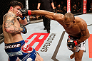 JARAGUA DO SUL, BRAZIL - MAY 18:   (R-L) Ronaldo "Jacare" Souza punches Chris Camozzi in their middleweight bout during the UFC on FX event on May 18, 2013 at Arena Jaragua in Jaragua do Sul, Santa Catarina, Brazil.  (Photo by Josh Hedges/Zuffa LLC/Zuffa LLC via Getty Images)