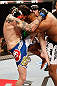 JARAGUA DO SUL, BRAZIL - MAY 18:   (L-R) Chris Camozzi knees Ronaldo 'Jacare' Souza in their middleweight bout during the UFC on FX event on May 18, 2013 at Arena Jaragua in Jaragua do Sul, Santa Catarina, Brazil.  (Photo by Josh Hedges/Zuffa LLC/Zuffa LLC via Getty Images)