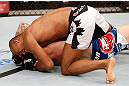 JARAGUA DO SUL, BRAZIL - MAY 18:   (L-R) Ronaldo 'Jacare' Souza secures an arm triangle choke submission against Chris Camozzi in their middleweight bout during the UFC on FX event on May 18, 2013 at Arena Jaragua in Jaragua do Sul, Santa Catarina, Brazil.  (Photo by Josh Hedges/Zuffa LLC/Zuffa LLC via Getty Images)