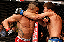 JARAGUA DO SUL, BRAZIL - MAY 18:   (L-R) Vitor Belfort punches Luke Rockhold in their middleweight bout during the UFC on FX event on May 18, 2013 at Arena Jaragua in Jaragua do Sul, Santa Catarina, Brazil.  (Photo by Josh Hedges/Zuffa LLC/Zuffa LLC via Getty Images)