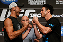 LAS VEGAS, NV - MAY 23:   (L-R) Opponents Donald "Cowboy" Cerrone and Karl "K.J." Noons face off during the UFC 160 Ultimate Media Day at the MGM Grand Hotel/Casino on May 23, 2013 in Las Vegas, Nevada.  (Photo by Josh Hedges/Zuffa LLC/Zuffa LLC via Getty Images)