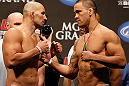 LAS VEGAS, NV - MAY 24:   (L-R) Opponents Glover Teixeira and James Te-Huna face off during the UFC 160 weigh-in at the MGM Grand Garden Arena on May 24, 2013 in Las Vegas, Nevada.  (Photo by Josh Hedges/Zuffa LLC/Zuffa LLC via Getty Images)