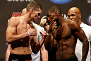 LAS VEGAS, NV - MAY 24:   (L-R) Opponents Stephen Thompson and Nah-Shon Burrell face off during the UFC 160 weigh-in at the MGM Grand Garden Arena on May 24, 2013 in Las Vegas, Nevada.  (Photo by Josh Hedges/Zuffa LLC/Zuffa LLC via Getty Images)