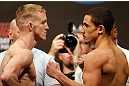 LAS VEGAS, NV - MAY 24:   (L-R) Opponents Colton Smith and Robert Whittaker face off during the UFC 160 weigh-in at the MGM Grand Garden Arena on May 24, 2013 in Las Vegas, Nevada.  (Photo by Josh Hedges/Zuffa LLC/Zuffa LLC via Getty Images)