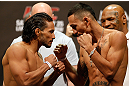 LAS VEGAS, NV - MAY 24:   (L-R) Opponents Dennis Bermudez and Max Holloway face off during the UFC 160 weigh-in at the MGM Grand Garden Arena on May 24, 2013 in Las Vegas, Nevada.  (Photo by Josh Hedges/Zuffa LLC/Zuffa LLC via Getty Images)