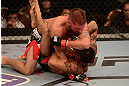 LAS VEGAS, NV - MAY 25:   Jeremy Stephens (top) elbows Estevan Payan in their featherweight bout during UFC 160 at the MGM Grand Garden Arena on May 25, 2013 in Las Vegas, Nevada.  (Photo by Donald Miralle/Zuffa LLC/Zuffa LLC via Getty Images)  *** Local Caption *** Jeremy Stephens; Estevan Payan