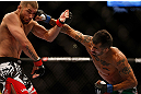 LAS VEGAS, NV - MAY 25:   (R-L) Estevan Payan punches Jeremy Stephens in their featherweight bout during UFC 160 at the MGM Grand Garden Arena on May 25, 2013 in Las Vegas, Nevada.  (Photo by Josh Hedges/Zuffa LLC/Zuffa LLC via Getty Images)  *** Local Caption *** Jeremy Stephens; Estevan Payan