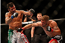 LAS VEGAS, NV - MAY 25:   (R-L) Jeremy Stephens punches Estevan Payan in their featherweight bout during UFC 160 at the MGM Grand Garden Arena on May 25, 2013 in Las Vegas, Nevada.  (Photo by Josh Hedges/Zuffa LLC/Zuffa LLC via Getty Images)  *** Local Caption *** Jeremy Stephens; Estevan Payan
