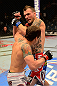 LAS VEGAS, NV - MAY 25:   Brian Bowles (bottom) punches George Roop in their bantamweight bout during UFC 160 at the MGM Grand Garden Arena on May 25, 2013 in Las Vegas, Nevada.  (Photo by Donald Miralle/Zuffa LLC/Zuffa LLC via Getty Images)  *** Local Caption *** Brian Bowles; George Roop