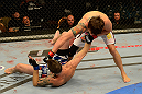 LAS VEGAS, NV - MAY 25:   Brian Bowles (right) punches George Roop in their bantamweight bout during UFC 160 at the MGM Grand Garden Arena on May 25, 2013 in Las Vegas, Nevada.  (Photo by Donald Miralle/Zuffa LLC/Zuffa LLC via Getty Images)  *** Local Caption *** Brian Bowles; George Roop