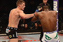 LAS VEGAS, NV - MAY 25:   (L-R) Stephen Thompson punches Nah-Shon Burrell in their welterweight bout during UFC 160 at the MGM Grand Garden Arena on May 25, 2013 in Las Vegas, Nevada.  (Photo by Donald Miralle/Zuffa LLC/Zuffa LLC via Getty Images)  *** Local Caption *** Stephen Thompson; Nah-Shon Burrell