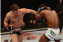 LAS VEGAS, NV - MAY 25:   (L-R) Stephen Thompson punches Nah-Shon Burrell in their welterweight bout during UFC 160 at the MGM Grand Garden Arena on May 25, 2013 in Las Vegas, Nevada.  (Photo by Donald Miralle/Zuffa LLC/Zuffa LLC via Getty Images)  *** Local Caption *** Stephen Thompson; Nah-Shon Burrell