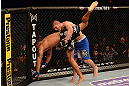 LAS VEGAS, NV - MAY 25:   (R-L) Khabib Nurmagomedov slams Abel Trujillo in their lightweight bout during UFC 160 at the MGM Grand Garden Arena on May 25, 2013 in Las Vegas, Nevada.  (Photo by Donald Miralle/Zuffa LLC/Zuffa LLC via Getty Images)  *** Local Caption *** Khabib Nurmagomedov; Abel Trujillo