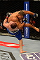 LAS VEGAS, NV - MAY 25:   Khabib Nurmagomedov (blue shorts) slams Abel Trujillo in their lightweight bout during UFC 160 at the MGM Grand Garden Arena on May 25, 2013 in Las Vegas, Nevada.  (Photo by Donald Miralle/Zuffa LLC/Zuffa LLC via Getty Images)  *** Local Caption *** Khabib Nurmagomedov; Abel Trujillo