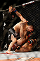LAS VEGAS, NV - MAY 25:   Rick Story (top) punches Mike Pyle in their welterweight bout during UFC 160 at the MGM Grand Garden Arena on May 25, 2013 in Las Vegas, Nevada.  (Photo by Josh Hedges/Zuffa LLC/Zuffa LLC via Getty Images)  *** Local Caption *** Mike Pyle; Rick Story