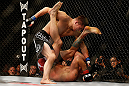 LAS VEGAS, NV - MAY 25:   Rick Story (top) punches Mike Pyle in their welterweight bout during UFC 160 at the MGM Grand Garden Arena on May 25, 2013 in Las Vegas, Nevada.  (Photo by Josh Hedges/Zuffa LLC/Zuffa LLC via Getty Images)  *** Local Caption *** Mike Pyle; Rick Story