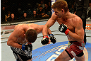 LAS VEGAS, NV - MAY 25:   (R-L) Mike Pyle punches Rick Story in their welterweight bout during UFC 160 at the MGM Grand Garden Arena on May 25, 2013 in Las Vegas, Nevada.  (Photo by Donald Miralle/Zuffa LLC/Zuffa LLC via Getty Images)  *** Local Caption *** Mike Pyle; Rick Story