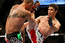 LAS VEGAS, NV - MAY 25:   (R-L) Karl Noons kicks Donald Cerrone in their lightweight bout during UFC 160 at the MGM Grand Garden Arena on May 25, 2013 in Las Vegas, Nevada.  (Photo by Josh Hedges/Zuffa LLC/Zuffa LLC via Getty Images)  *** Local Caption *** Donald Cerrone; Karl Noons