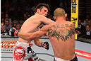 LAS VEGAS, NV - MAY 25:   (L-R) Karl Noons punches Donald Cerrone in their lightweight bout during UFC 160 at the MGM Grand Garden Arena on May 25, 2013 in Las Vegas, Nevada.  (Photo by Donald Miralle/Zuffa LLC/Zuffa LLC via Getty Images)  *** Local Caption *** Donald Cerrone; Karl Noons
