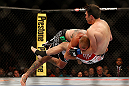 LAS VEGAS, NV - MAY 25:   (L-R) Donald Cerrone slams Karl Noons in their lightweight bout during UFC 160 at the MGM Grand Garden Arena on May 25, 2013 in Las Vegas, Nevada.  (Photo by Josh Hedges/Zuffa LLC/Zuffa LLC via Getty Images)  *** Local Caption *** Donald Cerrone; Karl Noons
