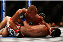 LAS VEGAS, NV - MAY 25:   Donald Cerrone (top) punches Karl Noons in their lightweight bout during UFC 160 at the MGM Grand Garden Arena on May 25, 2013 in Las Vegas, Nevada.  (Photo by Josh Hedges/Zuffa LLC/Zuffa LLC via Getty Images)  *** Local Caption *** Donald Cerrone; Karl Noons