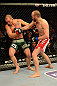 LAS VEGAS, NV - MAY 25:   (R-L) T.J. Grant punches Gray Maynard in their lightweight bout during UFC 160 at the MGM Grand Garden Arena on May 25, 2013 in Las Vegas, Nevada.  (Photo by Donald Miralle/Zuffa LLC/Zuffa LLC via Getty Images)  *** Local Caption *** Gray Maynard; T.J. Grant