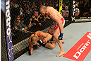 LAS VEGAS, NV - MAY 25:   (R-L) T.J. Grant punches Gray Maynard in their lightweight bout during UFC 160 at the MGM Grand Garden Arena on May 25, 2013 in Las Vegas, Nevada.  (Photo by Donald Miralle/Zuffa LLC/Zuffa LLC via Getty Images)  *** Local Caption *** Gray Maynard; T.J. Grant