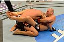 LAS VEGAS, NV - MAY 25:   (R-L) Glover Teixeira attempts to submit James Te-Huna in their light heavyweight bout during UFC 160 at the MGM Grand Garden Arena on May 25, 2013 in Las Vegas, Nevada.  (Photo by Donald Miralle/Zuffa LLC/Zuffa LLC via Getty Images)  *** Local Caption *** Glover Teixeira; James Te-Huna