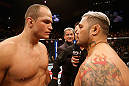 LAS VEGAS, NV - MAY 25:   (L-R) Junior dos Santos and Mark Hunt stare off before  their heavyweight bout during UFC 160 at the MGM Grand Garden Arena on May 25, 2013 in Las Vegas, Nevada.  (Photo by Josh Hedges/Zuffa LLC/Zuffa LLC via Getty Images)  *** Local Caption *** Junior dos Santos; Mark Hunt