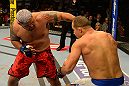 LAS VEGAS, NV - MAY 25:   (L-R) Mark Hunt punches Junior dos Santos in their heavyweight bout during UFC 160 at the MGM Grand Garden Arena on May 25, 2013 in Las Vegas, Nevada.  (Photo by Donald Miralle/Zuffa LLC/Zuffa LLC via Getty Images)  *** Local Caption *** Junior dos Santos; Mark Hunt