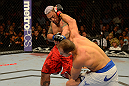 LAS VEGAS, NV - MAY 25:   (R-L) Junior dos Santos punches Mark Hunt in their heavyweight bout during UFC 160 at the MGM Grand Garden Arena on May 25, 2013 in Las Vegas, Nevada.  (Photo by Donald Miralle/Zuffa LLC/Zuffa LLC via Getty Images)  *** Local Caption *** Junior dos Santos; Mark Hunt