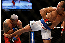 LAS VEGAS, NV - MAY 25:   (R-L) Junior dos Santos kicks Mark Hunt in their heavyweight bout during UFC 160 at the MGM Grand Garden Arena on May 25, 2013 in Las Vegas, Nevada.  (Photo by Josh Hedges/Zuffa LLC/Zuffa LLC via Getty Images)  *** Local Caption *** Junior dos Santos; Mark Hunt